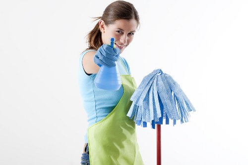 Professional carpet cleaner treating stains in a Richmond property