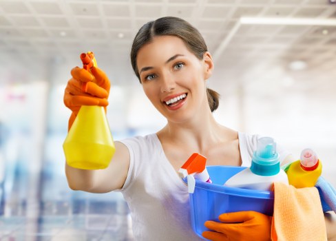 Local cleaner working in a Richmond kitchen and living area